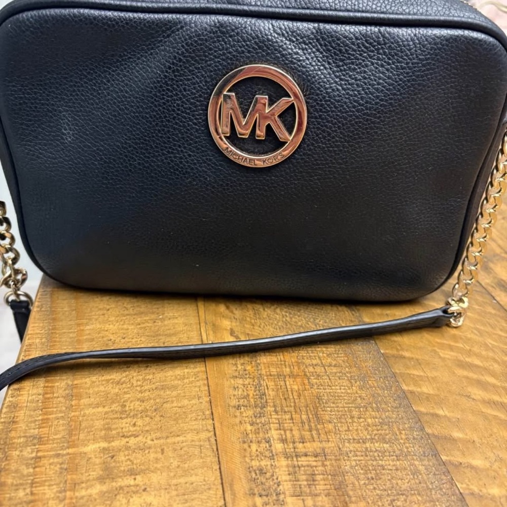 Michael Kors Black and Gold Crossbody Bag with Structured Design